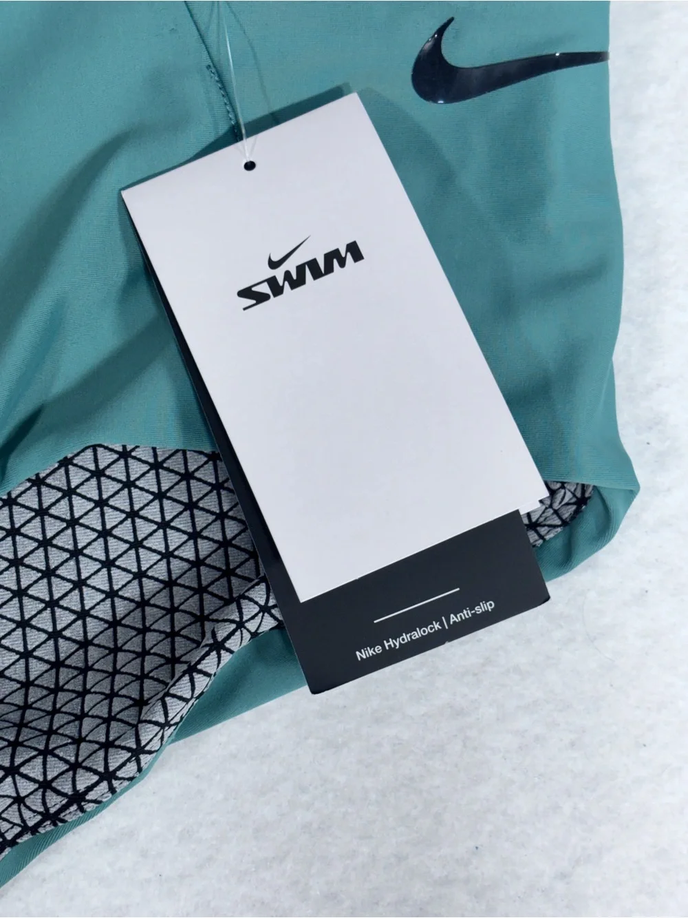 Nike Teal Swim Briefs with Geometric Lining
